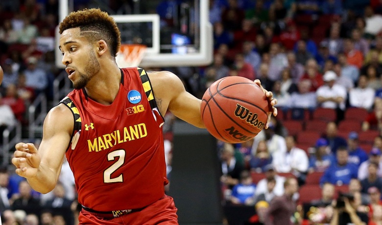 Mar 24, 2016; Louisville, KY, USA; Maryland Terrapins guard Melo Trimble (2) handles the ball against Kansas Jayhawks guard Devonte' Graham (4) during the first half in a semifinal game in the South regional of the NCAA Tournament at KFC YUM!. Mandatory Credit: Aaron Doster-USA TODAY Sports